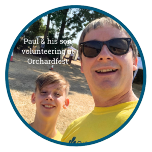 Paul and his son volunteering at Orchardfest