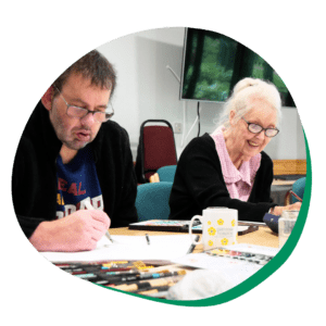 Two patients enjoying the art group at Primrose Hospice.