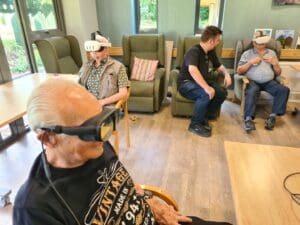 Patients at Primrose Hospice using Virtual Reality Headsets. 